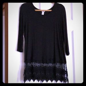 Can be worn as a shirt or a dress. Lace bottom